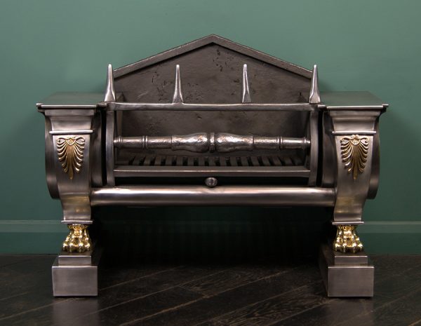 A Polished Steel Regency Sarcophagus Grate