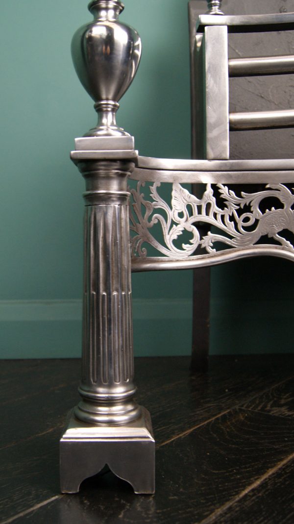 A Polished Steel & Cast-Iron Fire Grate