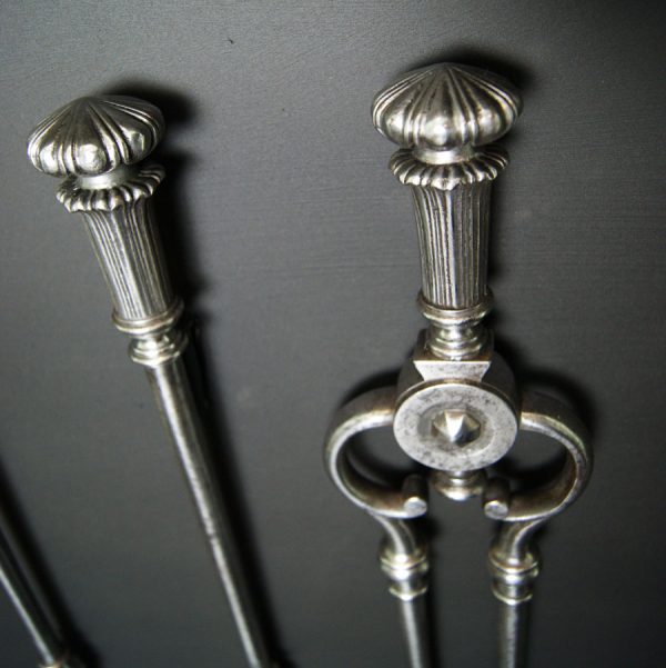 A Regency Period Set of Polished Steel Fire Irons