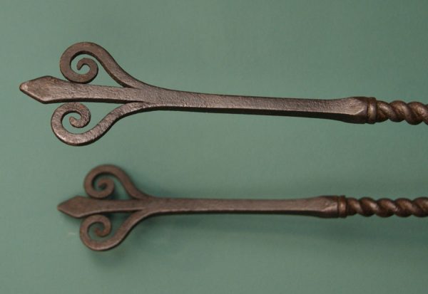 A Pair of Fine Wrought Fire Irons