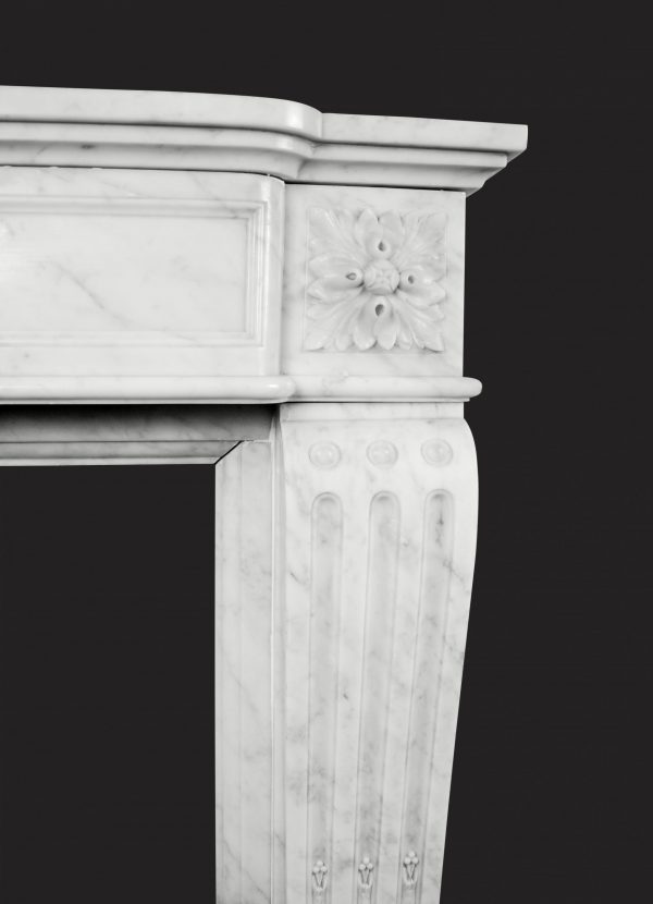 A Carrara Marble French Fireplace in the Louis XVI Manner