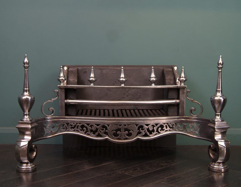 A Large Polished Wrought Dog Grate in the Regency Manner