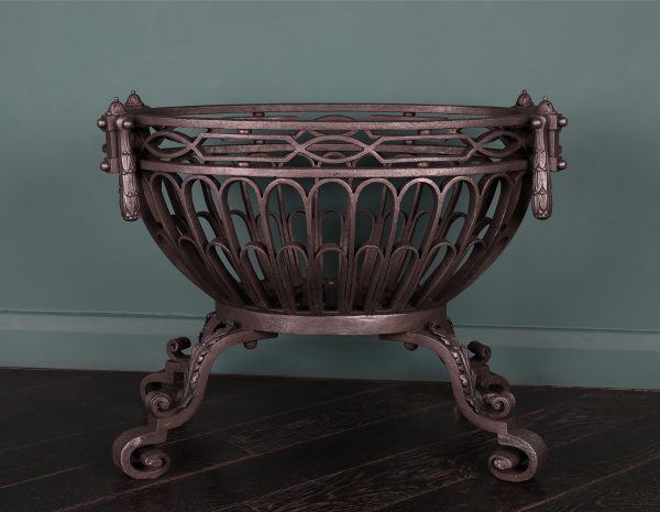 An Oval Wrought-Iron Fire Grate