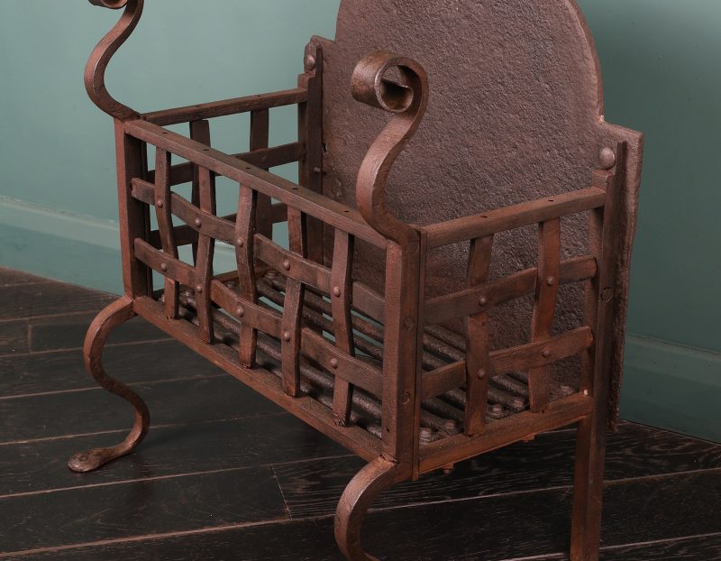 A Small Wrought-Iron Fireplace Grate Basket