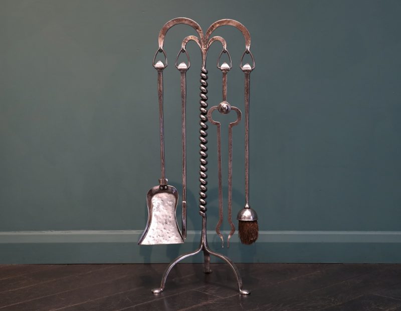 A Set of Aesthetic Movement Wrought Fire Tools and Stand
