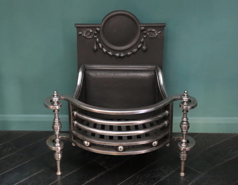 English Late 19th Century Polished Wrought Fire Basket in the Regency Form