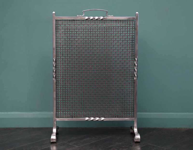 An Aesthetic Movement Polished Steel Fire Screen Circa 1890