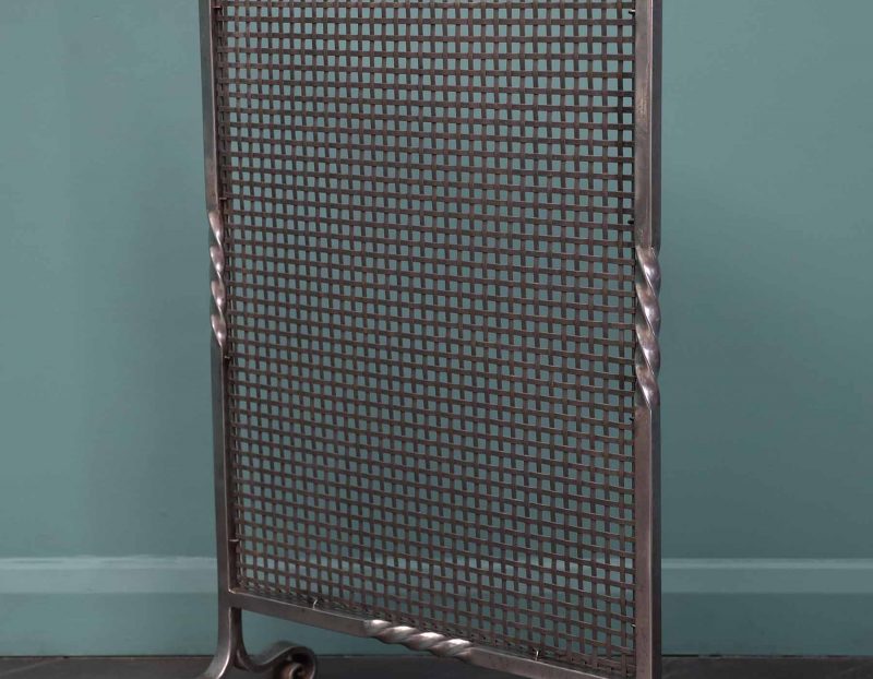 An Aesthetic Movement Polished Steel Fire Screen Circa 1890