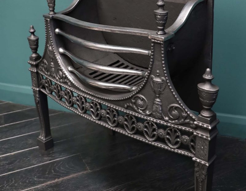 An Elegant 19th Century Wrought & Cast Fire Grate in the Neo-Classical Manner