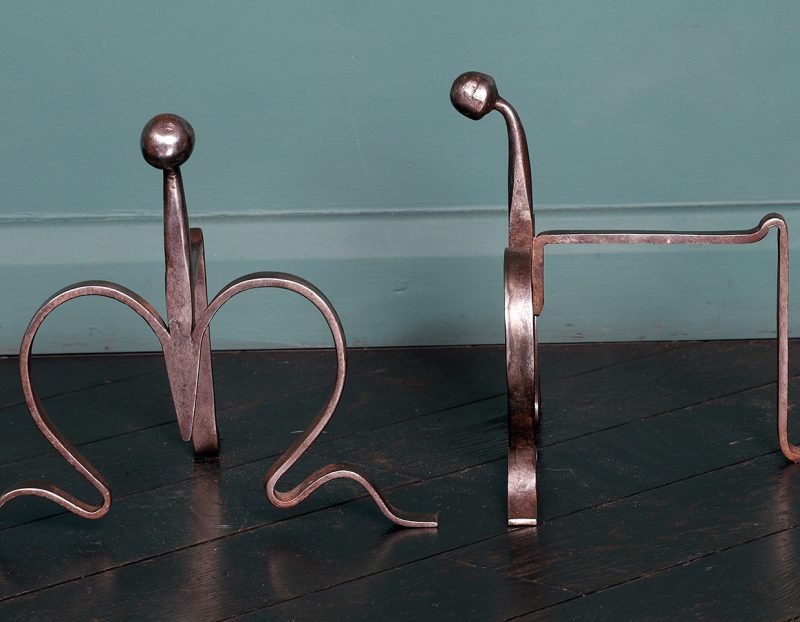 A Pair of Wrought Arts & Crafts Fire Tool Rests with ball finial
